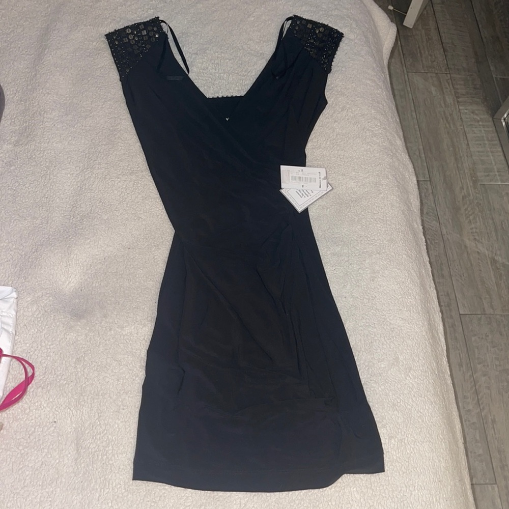 B. DARLIN dress with open back